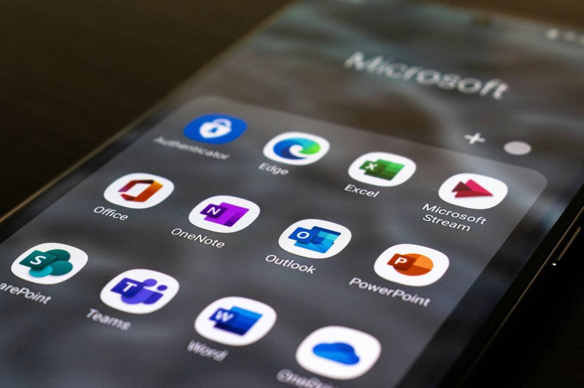 Woman using successful resolution app for stress relief during work break