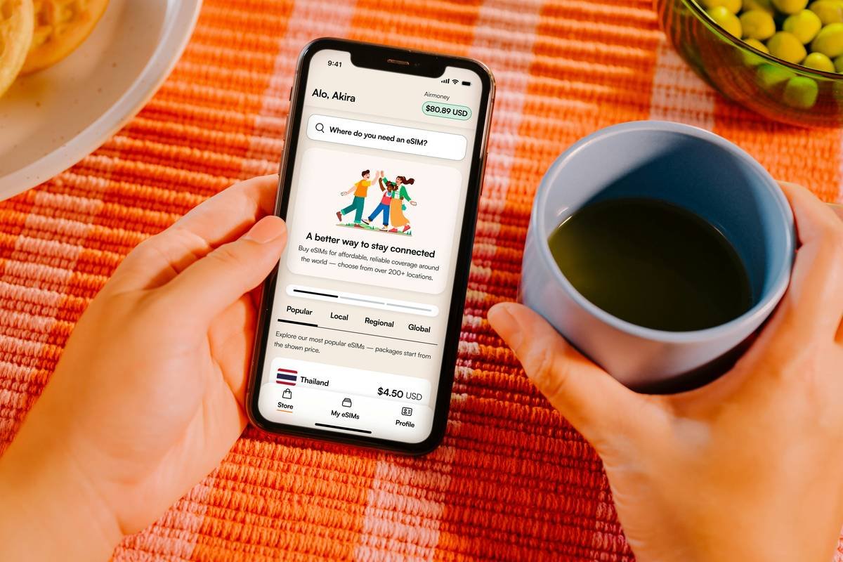 Woman using a stress and anxiety companion app during a work break to reduce tension